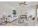 Bright and inviting living room with neutral decor and a comfortable seating arrangement at 15731 W Redfield Rd, Surprise, AZ 85379