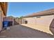 Gated side yard featuring low-maintenance desert landscaping at 15731 W Redfield Rd, Surprise, AZ 85379