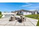 Expansive backyard features a sparkling pool, a comfortable seating area, and well-manicured landscaping, offering a private retreat at 17084 N Palo Pino St, Maricopa, AZ 85138