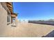 Spacious backyard features a blank canvas with block wall fence, ready for personalization at 17803 W Elm St, Goodyear, AZ 85395