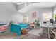 Bedroom includes a daybed, workstation, and two windows offering ample natural light, creating a comfortable workspace at 1803 E Palm Beach Dr, Chandler, AZ 85249