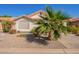 Charming home featuring a desert landscape, a red tiled roof, and a mature palm tree in the front yard at 1803 E Palm Beach Dr, Chandler, AZ 85249