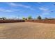 Fully enclosed expansive backyard surrounded by a wooden fence, offering a private outdoor space at 1944 W Osborn Rd, Phoenix, AZ 85015