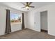 Bedroom with closet, natural light, and neutral colored carpet at 1944 W Osborn Rd, Phoenix, AZ 85015
