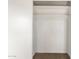 Walk-in closet features ample shelving and carpeted floors at 1944 W Osborn Rd, Phoenix, AZ 85015