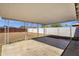 Covered backyard patio with concrete slab, offering a versatile space for outdoor living and leisure at 1944 W Osborn Rd, Phoenix, AZ 85015