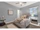 Serene bedroom featuring a plush bed, neutral tones, and soft lighting for a relaxing ambiance at 20165 E Via Del Palo Dr, Queen Creek, AZ 85142