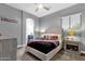 Fun bedroom with a ceiling fan, soft carpet, and fun decorations at 20165 E Via Del Palo Dr, Queen Creek, AZ 85142