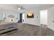 Spacious main bedroom with large windows, ceiling fan, and ensuite bathroom at 20165 E Via Del Palo Dr, Queen Creek, AZ 85142