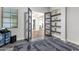 This office features neutral walls, a storage cabinet, and plenty of natural light from the windows at 20165 E Via Del Palo Dr, Queen Creek, AZ 85142