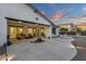Covered patio with outdoor furniture overlooking landscaped yard and pool area at 20165 E Via Del Palo Dr, Queen Creek, AZ 85142