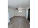 Spacious bedroom with ceiling fan, new floors, large window and closet at 2853 W Ohio St, Apache Junction, AZ 85120