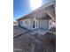 Covered patio with white columns and fenced yard at 2853 W Ohio St, Apache Junction, AZ 85120