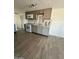 Updated kitchen features gray cabinets, stainless steel appliances, and sleek countertop at 2853 W Ohio St, Apache Junction, AZ 85120