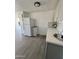 Modern kitchen with stainless steel refrigerator and bright countertops at 2853 W Ohio St, Apache Junction, AZ 85120
