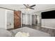 Main bedroom boasts wood-look floors, barn door to bath and mirrored closet at 3201 W Evans Dr, Phoenix, AZ 85053