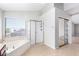 Bathroom with large tub, stand up shower and large window for natural light at 3761 W Kent Dr, Chandler, AZ 85226