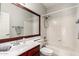 Functional bathroom features a shower over tub and single sink with storage at 3761 W Kent Dr, Chandler, AZ 85226