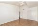 A bright bedroom with wood floors, and closet at 3761 W Kent Dr, Chandler, AZ 85226