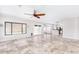 Light-filled living room with windows, patio doors, and tile flooring, perfect for relaxing or hosting gatherings at 3761 W Kent Dr, Chandler, AZ 85226