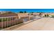 View from the patio with white railings overlooking rooftops and green landscaping at 3761 W Kent Dr, Chandler, AZ 85226