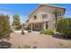 Exterior of a home showcasing the backyard, pool, and mature desert landscaping at 4207 E Rockledge Rd, Phoenix, AZ 85044
