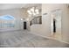 Open concept entryway with a staircase, neutral tones, and tile flooring at 4207 E Rockledge Rd, Phoenix, AZ 85044
