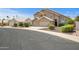 Beautiful desert home with a three-car garage and low maintenance landscaping at 4207 E Rockledge Rd, Phoenix, AZ 85044