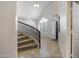 Bright foyer featuring a staircase, high ceilings and a black front door at 4207 E Rockledge Rd, Phoenix, AZ 85044