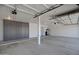 Spacious garage with built-in storage cabinets and lots of open floor space at 4207 E Rockledge Rd, Phoenix, AZ 85044