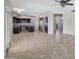 Modern kitchen featuring black cabinetry, stainless steel appliances, and an island at 4207 E Rockledge Rd, Phoenix, AZ 85044