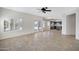 Bright living space featuring tile flooring, backyard access, and natural light at 4207 E Rockledge Rd, Phoenix, AZ 85044