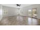 Bright living space featuring tile flooring, natural light, and patio access at 4207 E Rockledge Rd, Phoenix, AZ 85044