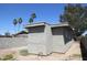 Exterior view of the home with palm trees in the background at 4624 S 19Th Ave, Phoenix, AZ 85041