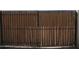 Sturdy wooden gate providing security and privacy at 4624 S 19Th Ave, Phoenix, AZ 85041