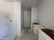 Bathroom with a shower and tub combination and vanity at 47230 W Cansados Rd, Maricopa, AZ 85139