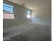 Bedroom with two windows providing natural light at 47230 W Cansados Rd, Maricopa, AZ 85139