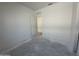 A bedroom with a door leading to another room at 47230 W Cansados Rd, Maricopa, AZ 85139