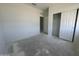 Bedroom with a closet and fresh white walls, ready to be personalized at 47230 W Cansados Rd, Maricopa, AZ 85139