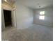 Well-lit bedroom with a neutral color scheme and bright window at 47230 W Cansados Rd, Maricopa, AZ 85139