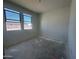 Bedroom with two large windows bringing in natural light at 47230 W Cansados Rd, Maricopa, AZ 85139