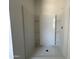 New shower with built-in shelves and modern design elements at 47230 W Cansados Rd, Maricopa, AZ 85139