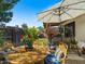 Spacious backyard with a porch swing and dining area, perfect for outdoor gatherings and enjoying sunny days at 5517 W Commonwealth Pl, Chandler, AZ 85226