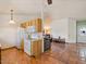 The kitchen area features bright white appliances and an open concept at 5517 W Commonwealth Pl, Chandler, AZ 85226