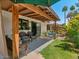 Cozy covered patio featuring comfortable seating and a lush green lawn, perfect for outdoor relaxation at 5517 W Commonwealth Pl, Chandler, AZ 85226