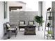 Cozy outdoor patio area with comfortable seating and a stylish fire pit at 5834 S Daisy Patch Pl, Phoenix, AZ 85040