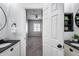 View from the bathroom into a bright bedroom at 6742 W El Cortez Pl, Peoria, AZ 85383