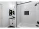 Bright bathroom featuring subway tile shower and black accents at 6742 W El Cortez Pl, Peoria, AZ 85383