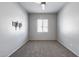 Empty bedroom showcasing neutral walls, carpet and a ceiling fan at 6742 W El Cortez Pl, Peoria, AZ 85383