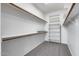 Walk-in closet with rod and shelf storage at 6742 W El Cortez Pl, Peoria, AZ 85383